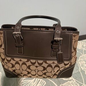 Coach signature used very Gently in great condition
